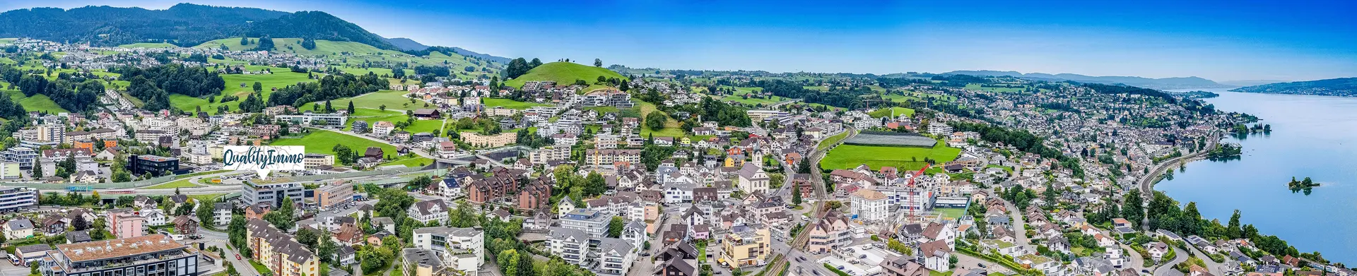QualityImmo GmbH - Immobilienagentur in Wollerau
